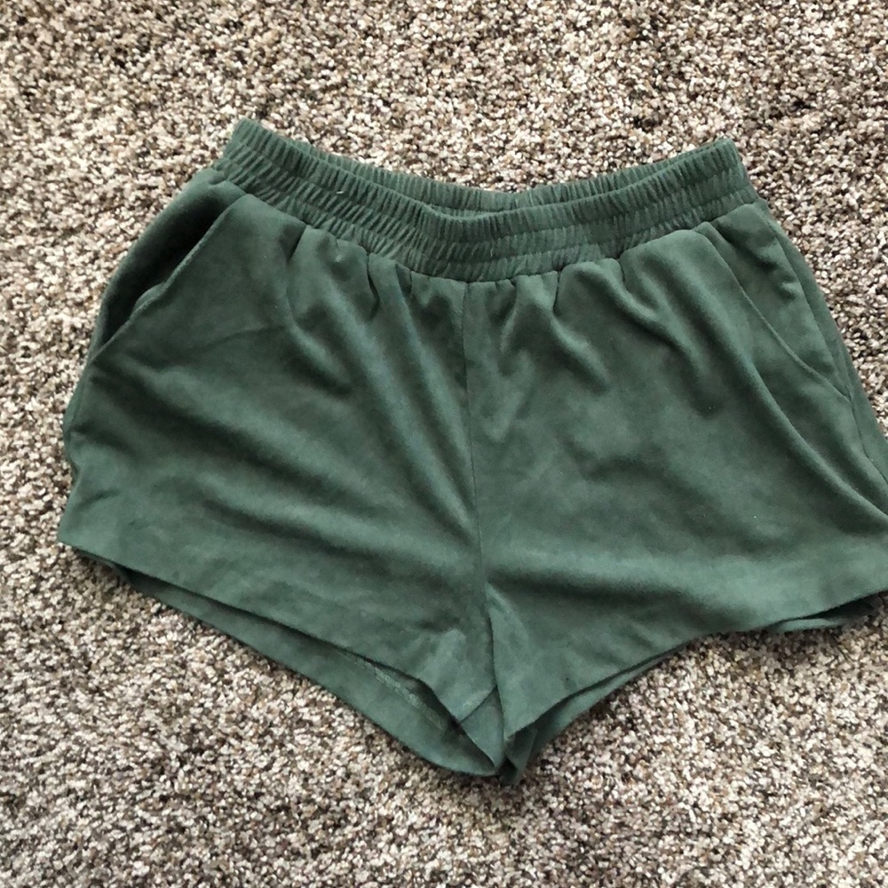 Green velvet material shorts with pockets